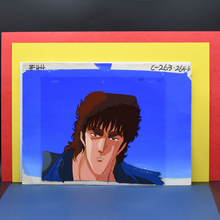 Load image into Gallery viewer, Fist of the North Star - Kenshiro Close-Up: Fire in the Eyes on Blue Sky - Original Animation Cel and Background