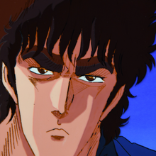 Load image into Gallery viewer, Fist of the North Star - Kenshiro Close-Up: Fire in the Eyes on Blue Sky - Original Animation Cel and Background