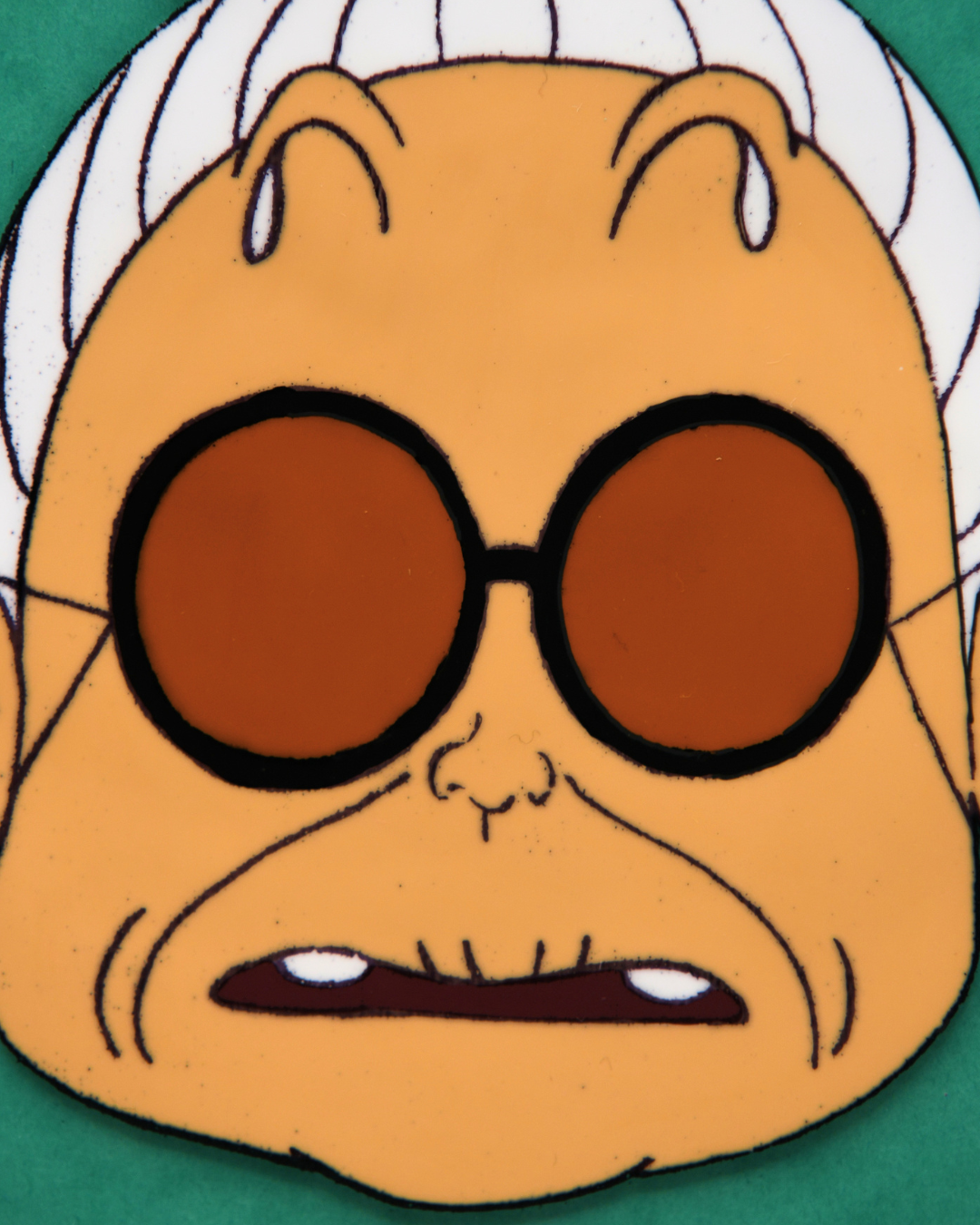 Oma face and round sunglasses detail on original Dr. Slump production cel