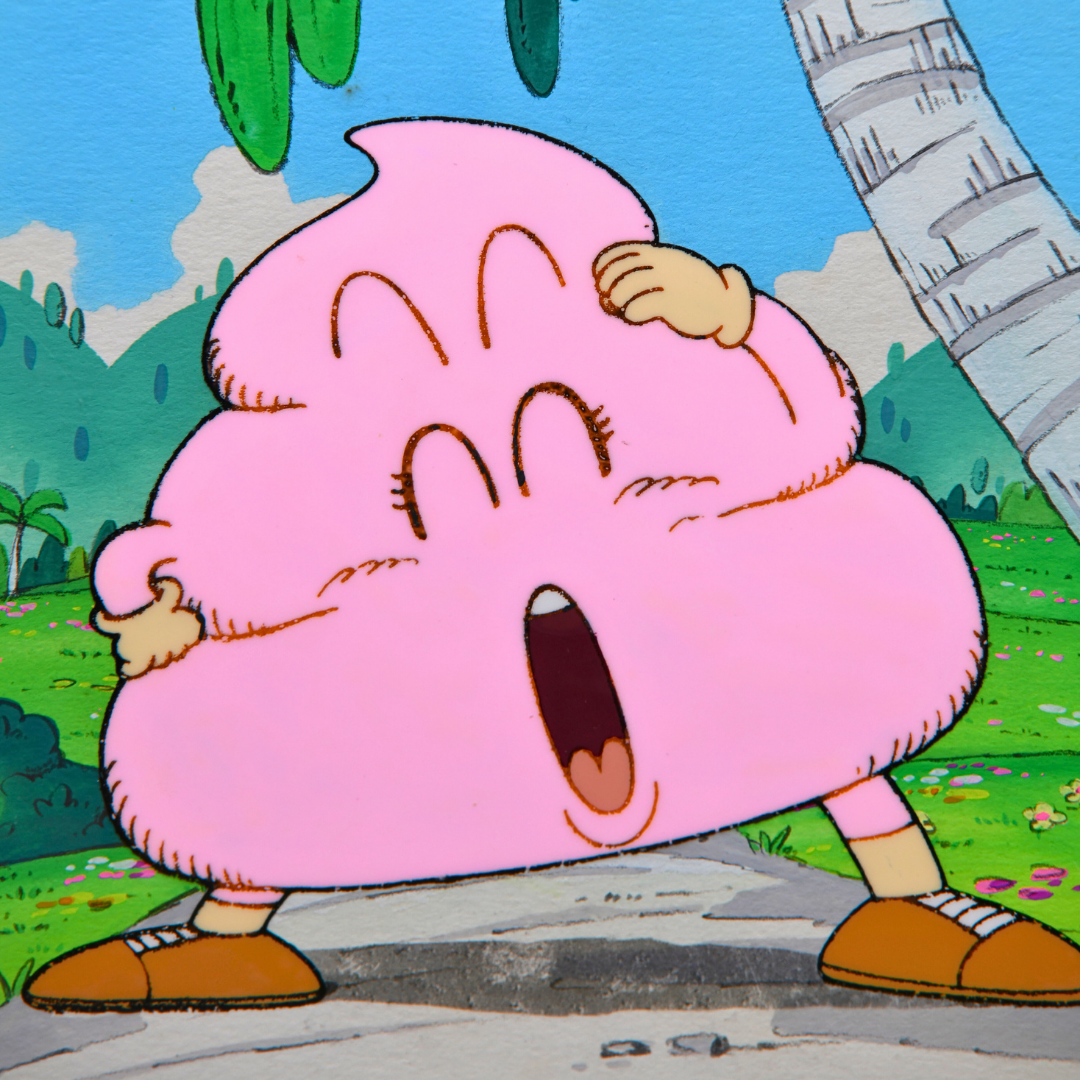 Close-up detail of Pink Poop original hand-painted production cel from Dr. Slump