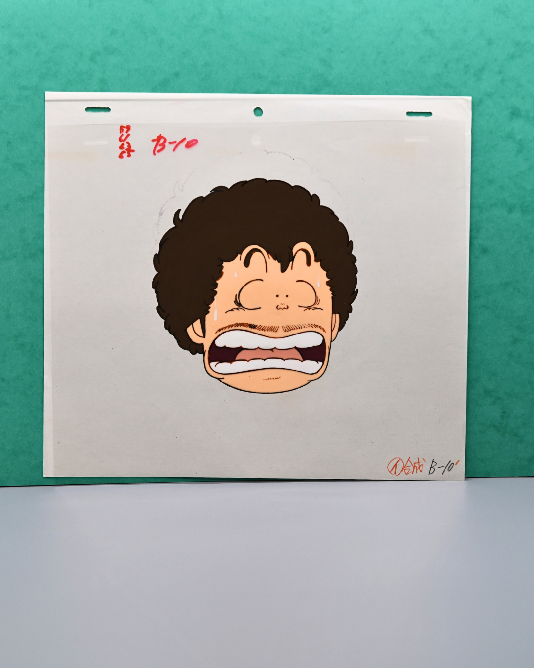 Dr. Slump Senbei Norimaki screaming floating head original hand-painted production cel, full sheet with B-10 marking