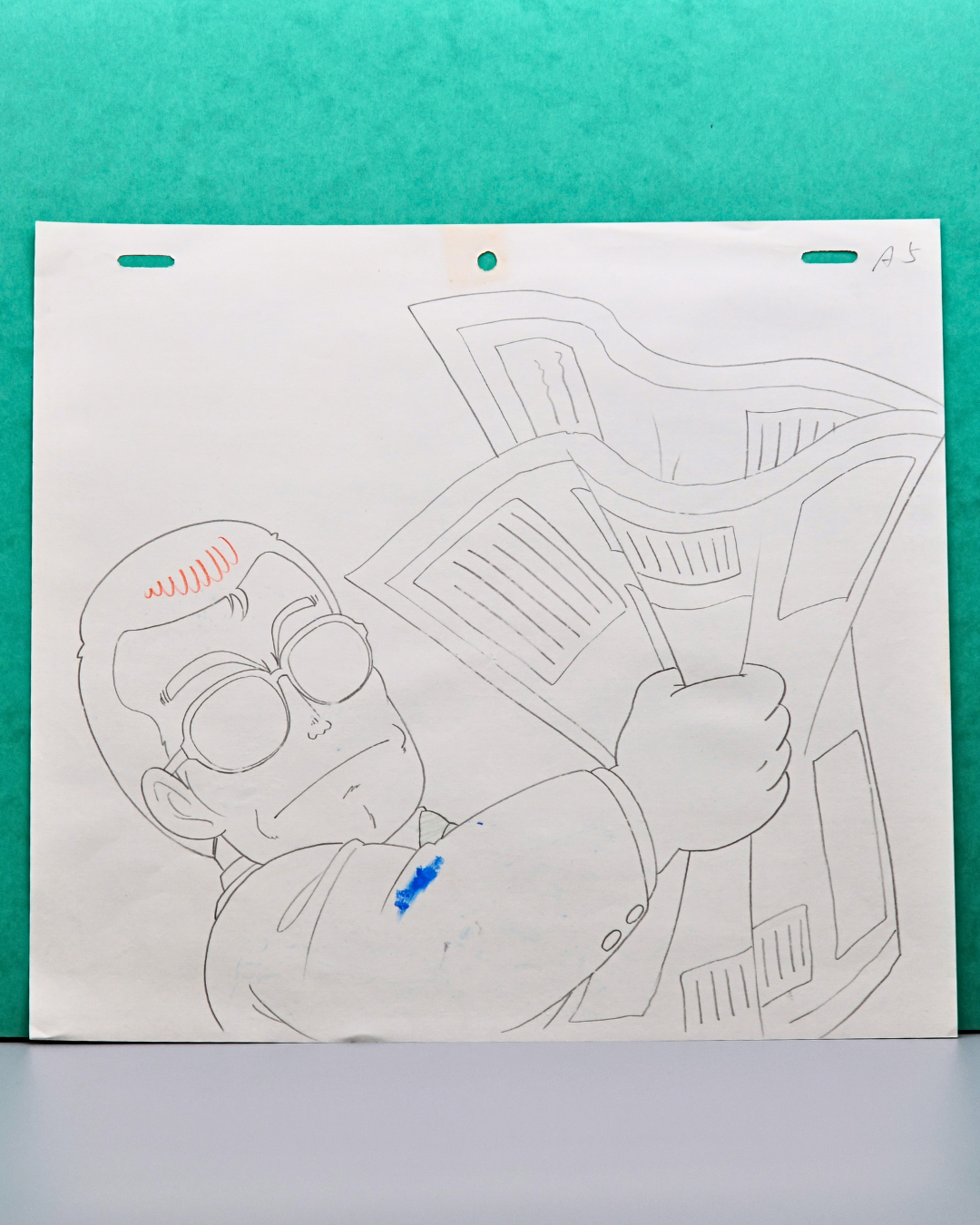 Suppaman reading newspaper matching production douga from Dr. Slump, full view