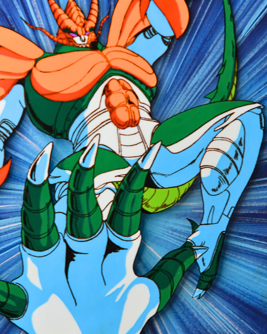Close-up detail of Jūshin Liger Dorga Monster A2 giant production cel on blue background