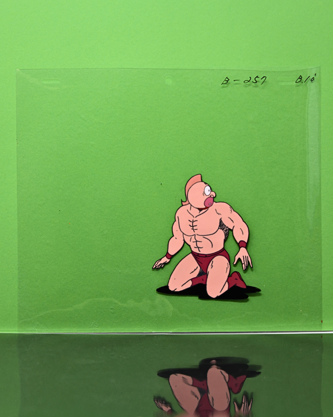 Kinnikuman original production cel kneeling with surprised expression