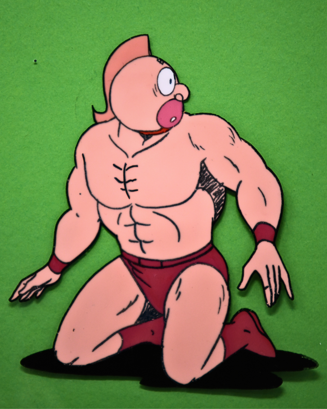Close-up of Kinnikuman surprised expression on original production cel