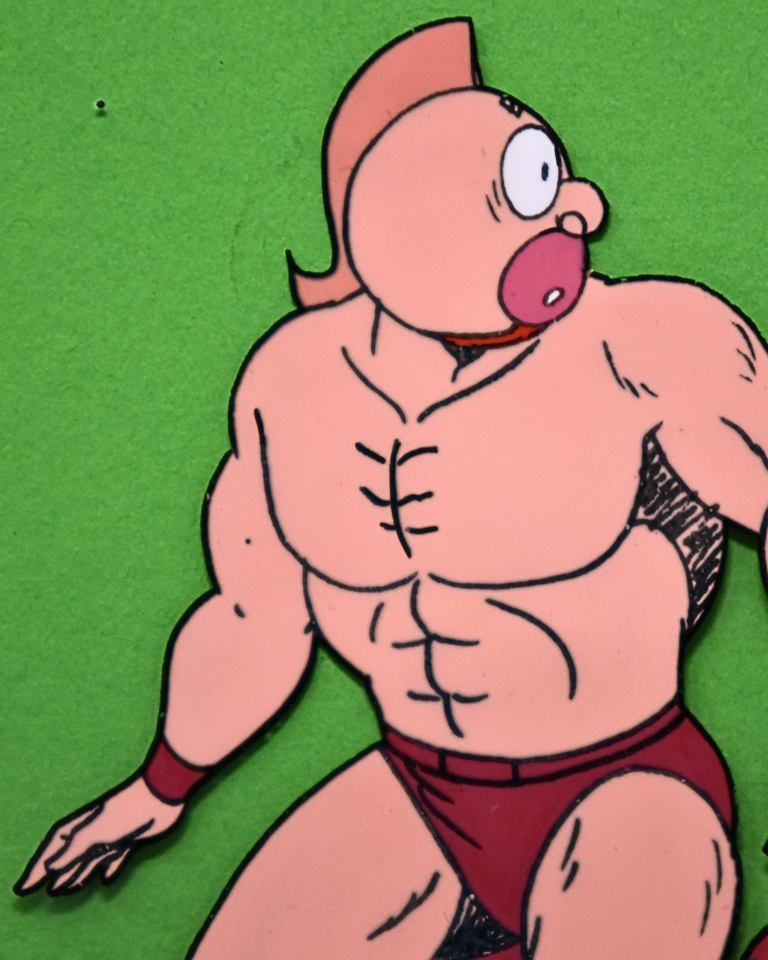 Detail of Kinnikuman kneeling original production cel body and expression