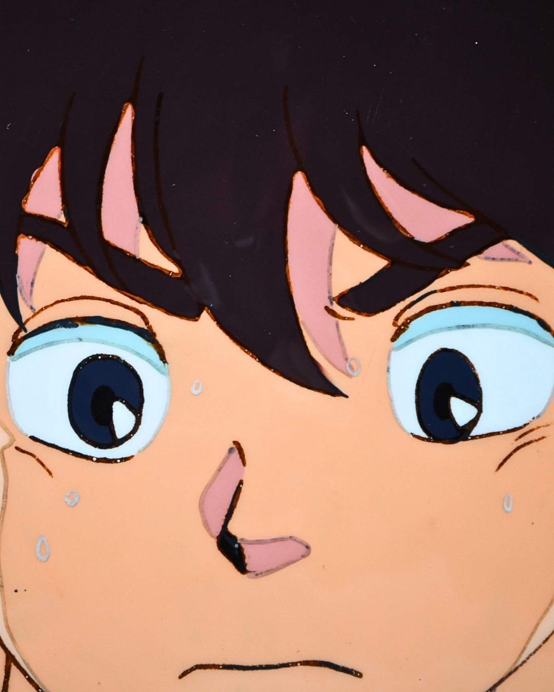 Close-up detail of Yusaku Godai original Maison Ikkoku production cel
