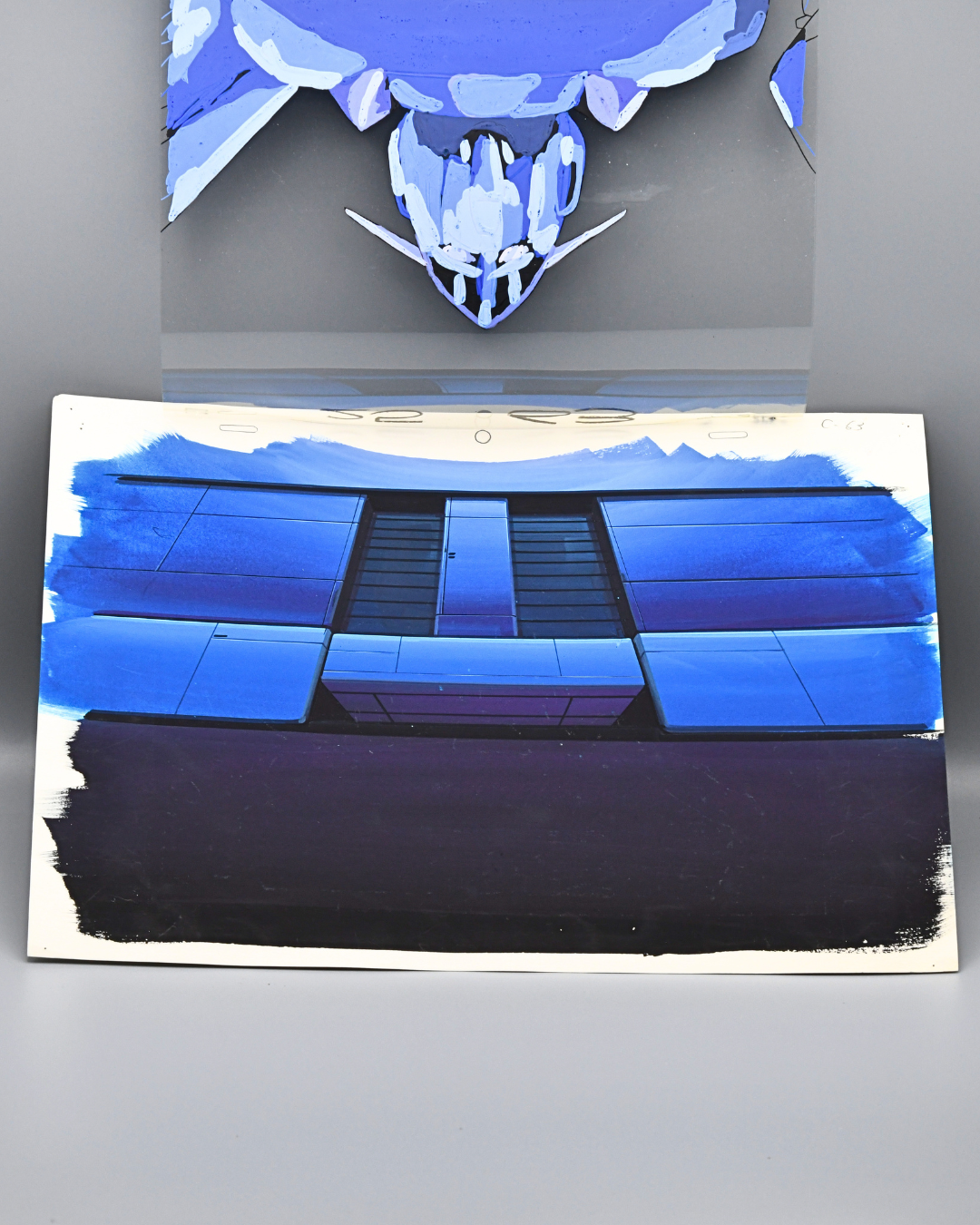 Original hand-painted background from Metal Armor Dragonar Falguen production scene shown separately from cel