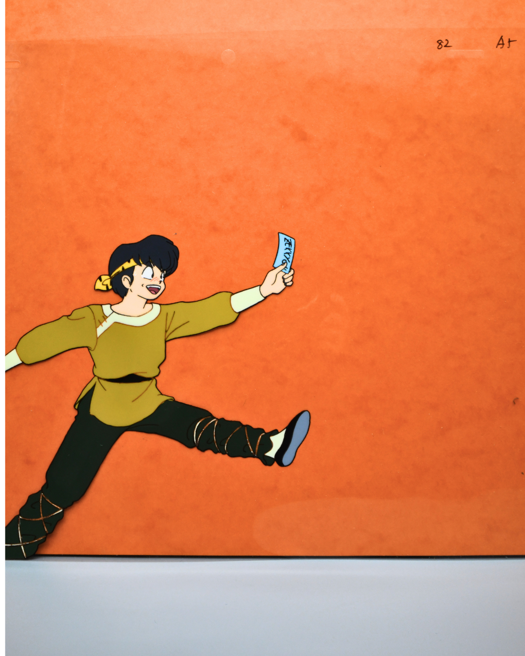 Ryoga Hibiki from Ranma ½, original hand-painted production cel, full dynamic pose holding a ticket